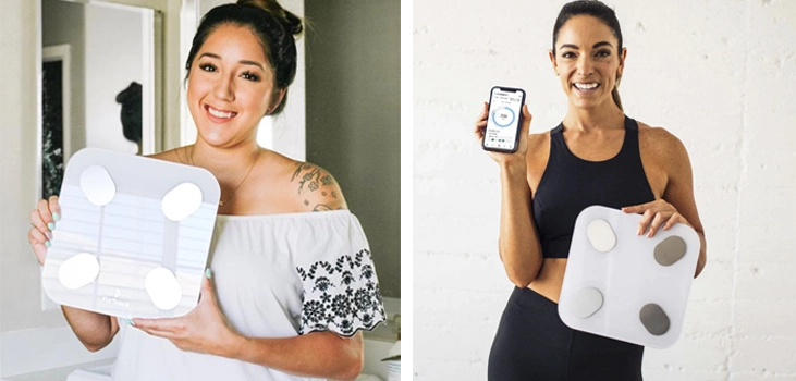 slide of two happy women holding the smart scale